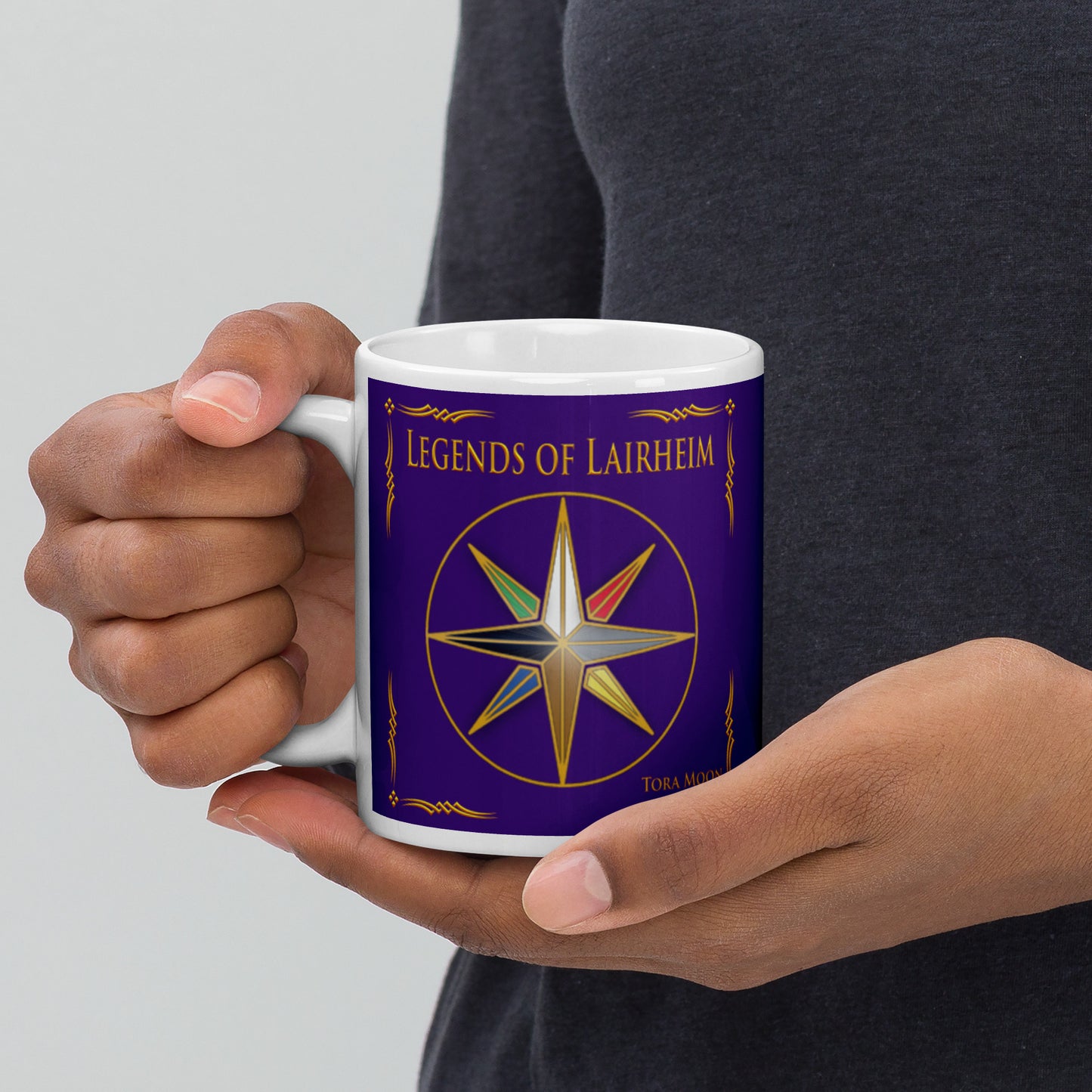 Woman holding a Legends of Lairheim Elemental Star mug