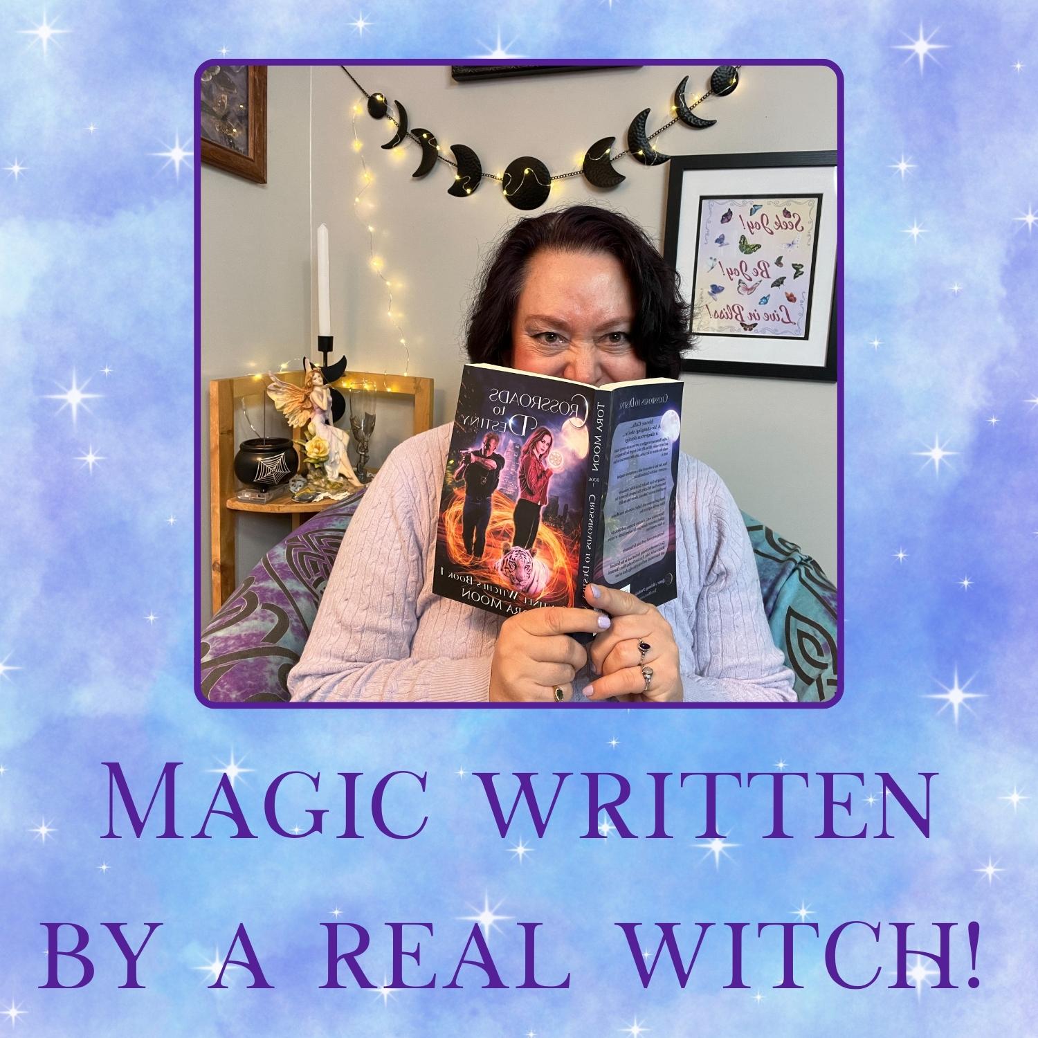 Image of author holding book with text: Magic Written by a Real Witch