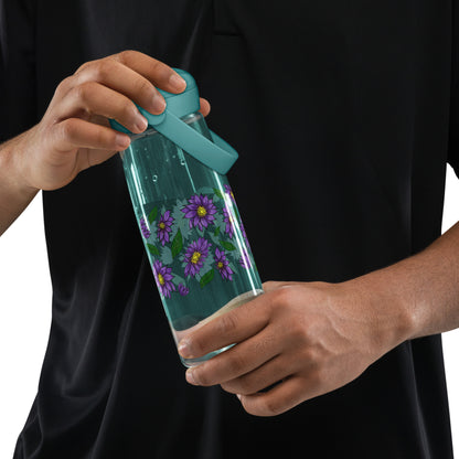 Person holding a Purple Daisies Flip Straw Water Bottle cove blue