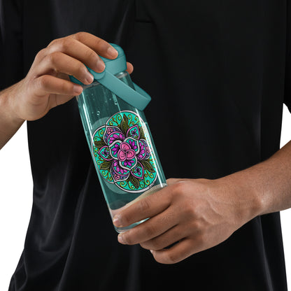 Person holding a clear water bottle with Triquetra Bloom Mandala Flip Straw Water Bottle cove blue