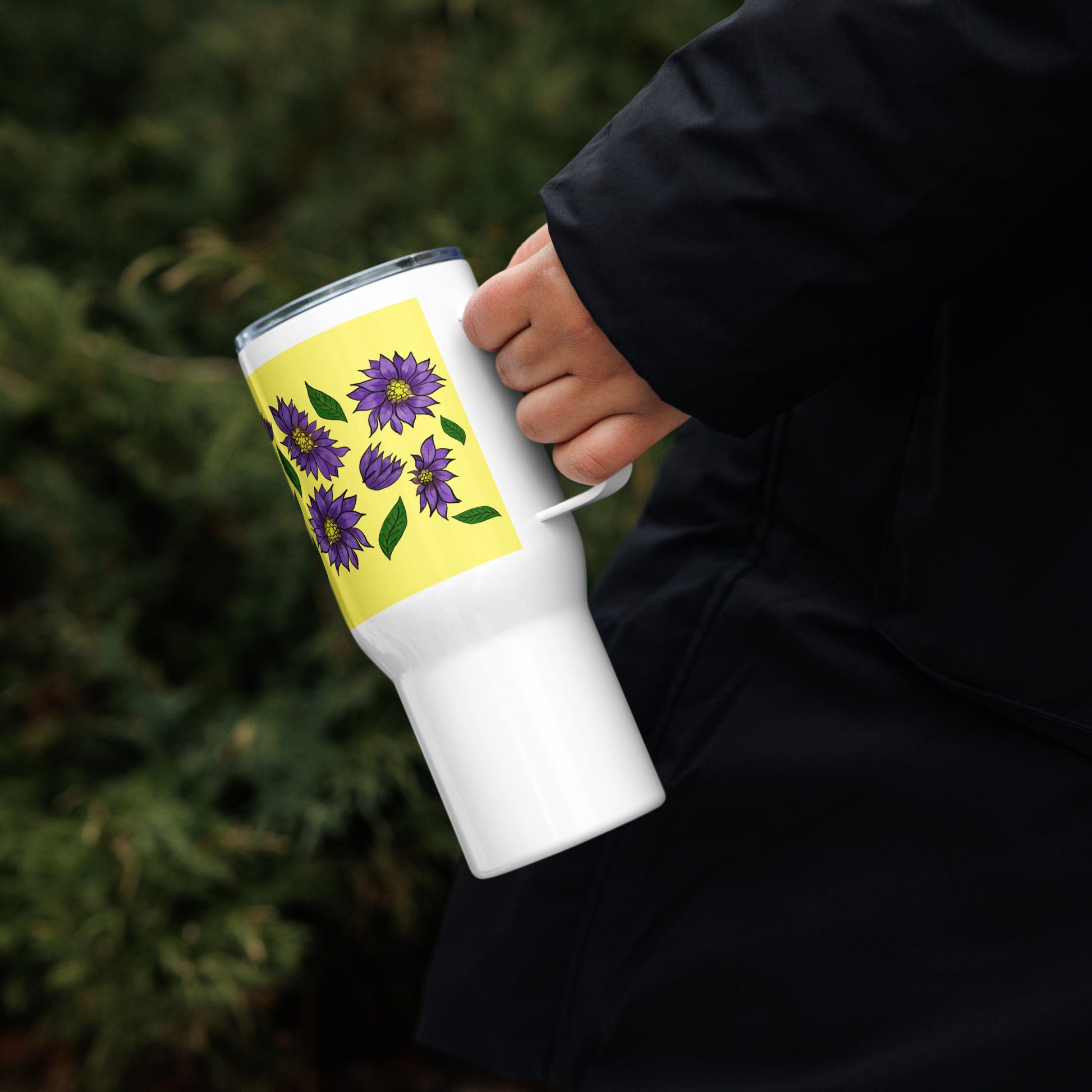 product mockup travel cup with Tora's purple daisies art design